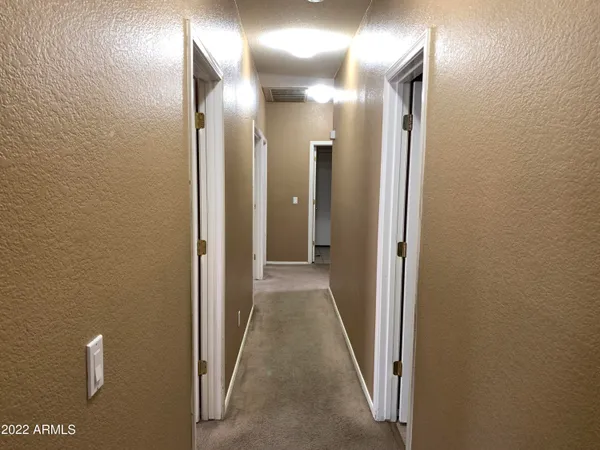 a view of a hallway with a elevator