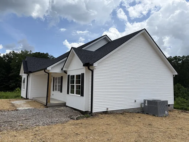 a view of a balcony with wooden floor