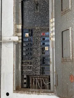 a kitchen with a stove and a microwave