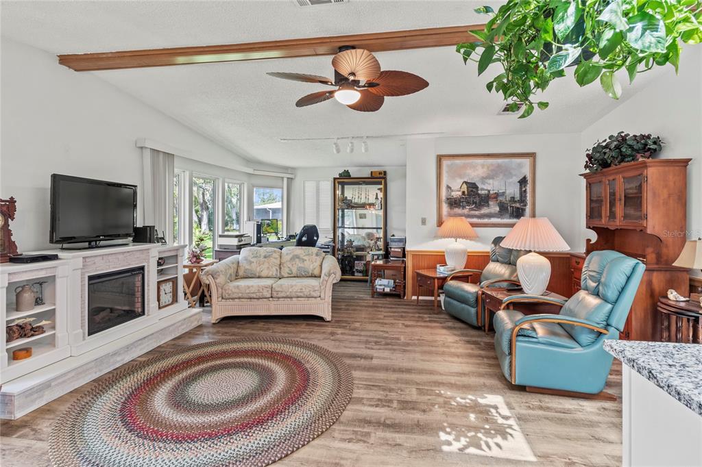 83 Eagle Circle Ellenton, FL 34222 - Photo 22 of 60 a living room with furniture and a flat screen tv