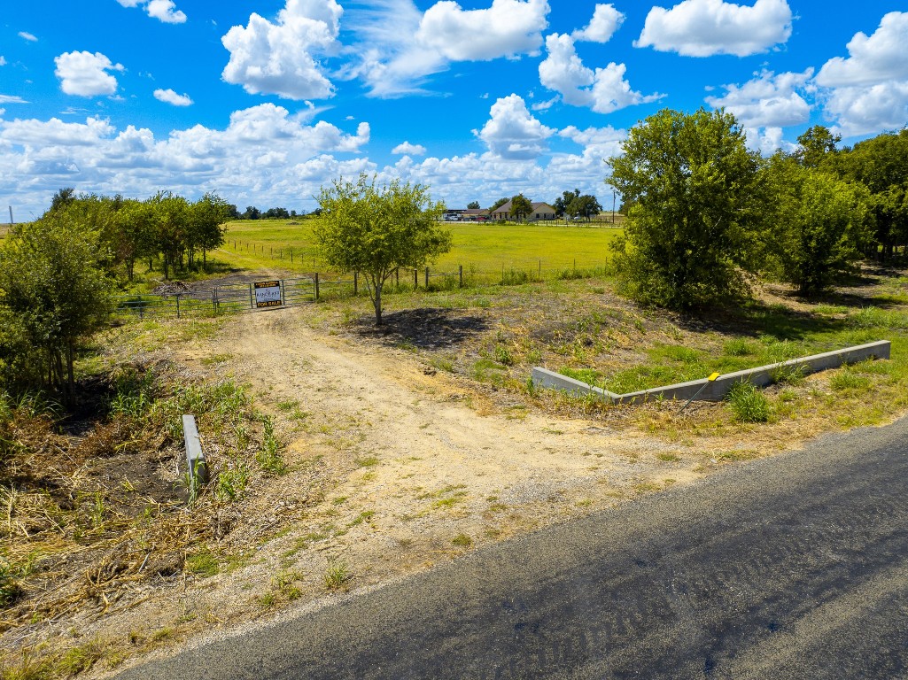 0 Tract 2 Cr Coupland, TX 78615 - Photo 21 of 34 a view of a yard with swimming pool and outdoor seating