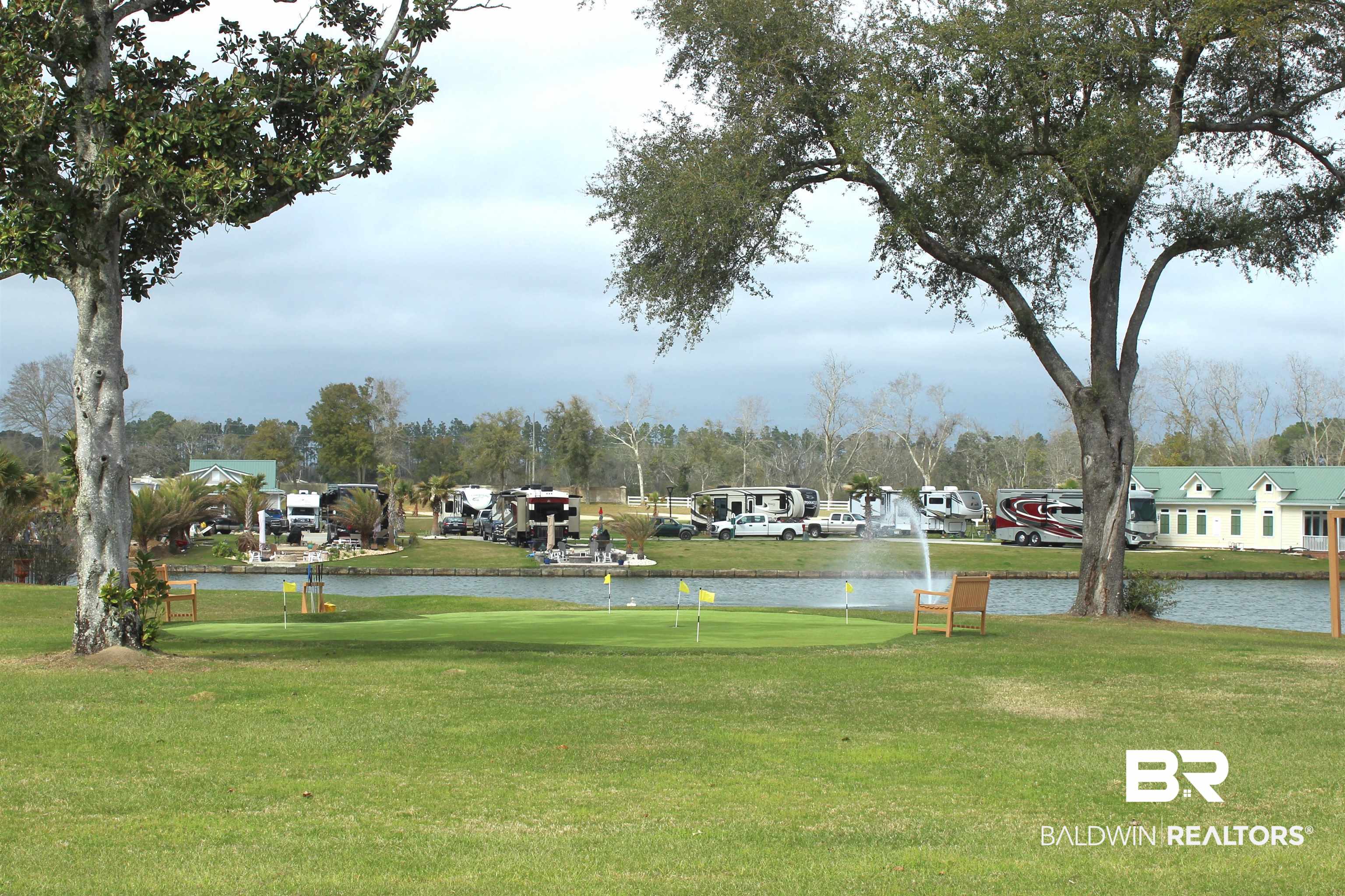 28085 Migratory Way Elberta, AL 36530 - Photo 53 of 59 View of home's community featuring a water view and a lawn