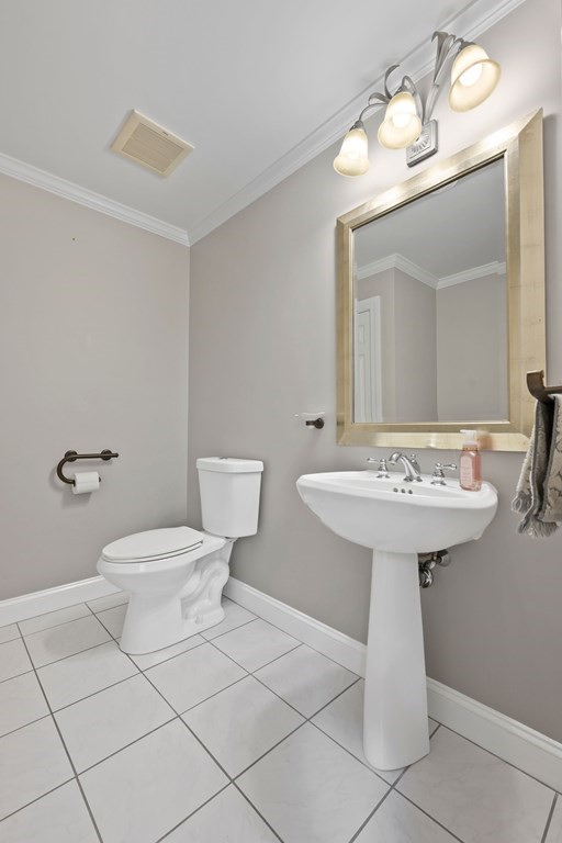 182 Boston Street Middleton, MA 01949 - Photo 24 of 42 a bathroom with a sink toilet and mirror