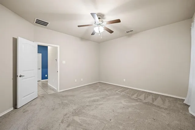 a bathroom with a double vanity sink mirror and double