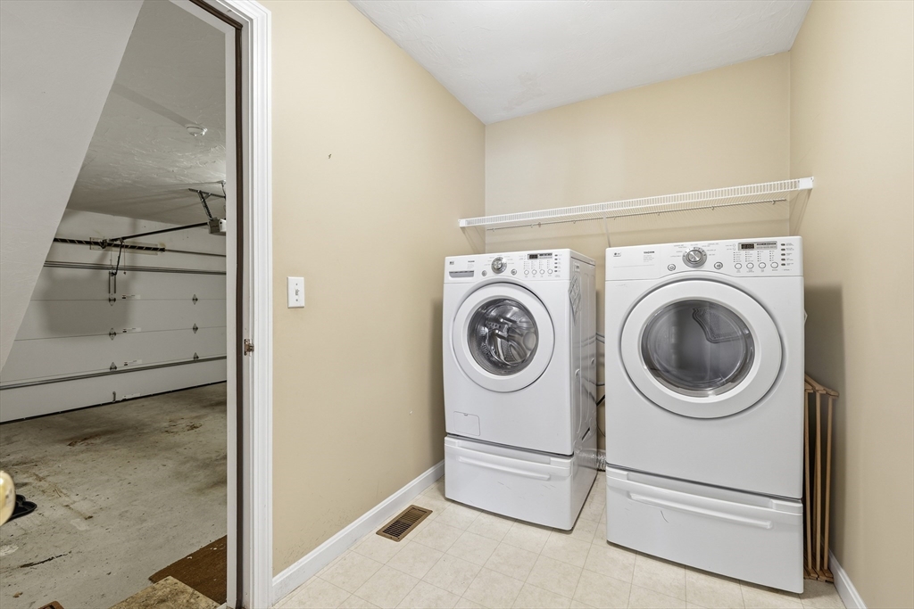 9 Rock Marsh Road, Unit B Wareham, MA 02571 - Photo 29 of 41 a utility room with dryer and washer