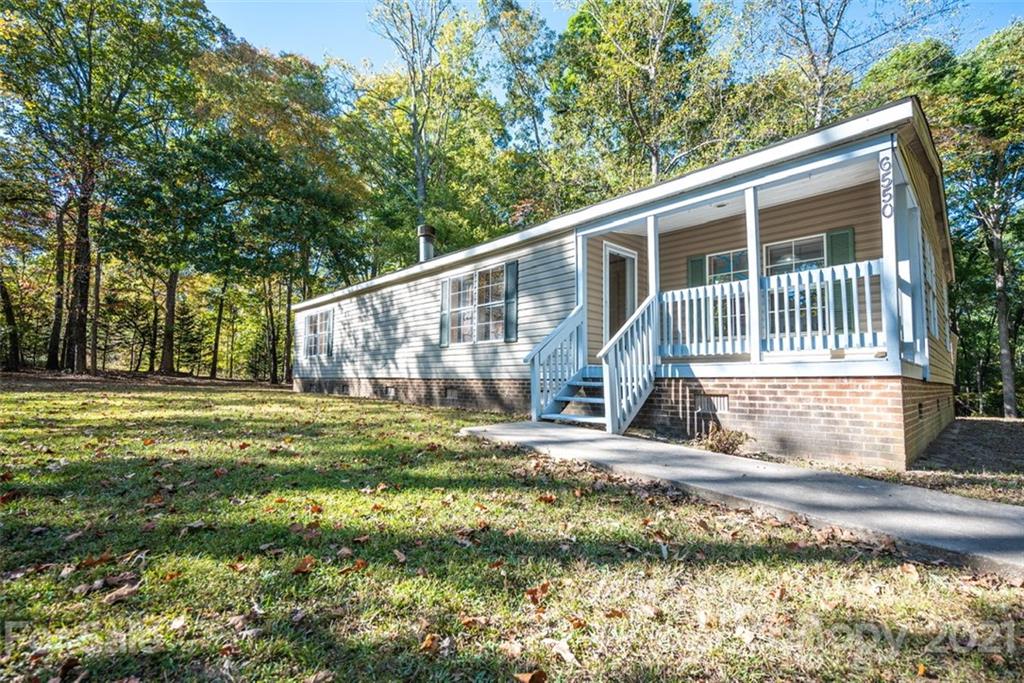 6550 Lewis Road Kings Mountain, NC 28086 - Photo 2 of 20 a view of a house with a yard