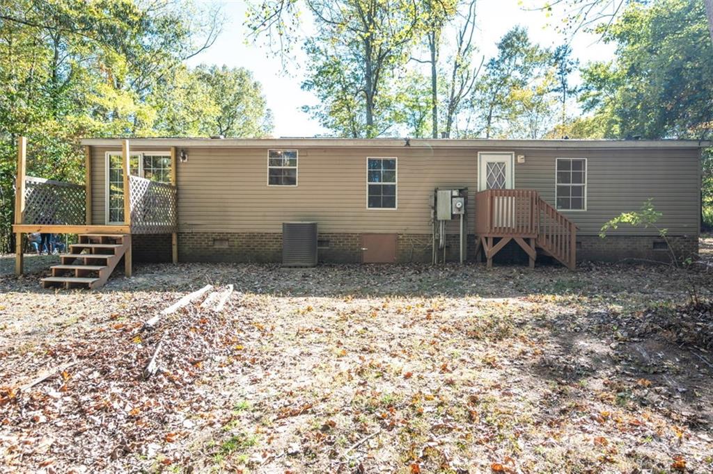 6550 Lewis Road Kings Mountain, NC 28086 - Photo 19 of 20 front view of a house with a yard