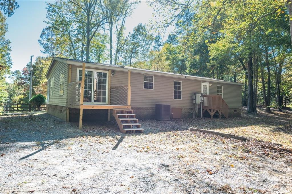 6550 Lewis Road Kings Mountain, NC 28086 - Photo 20 of 20 a view of a house with a yard and garage
