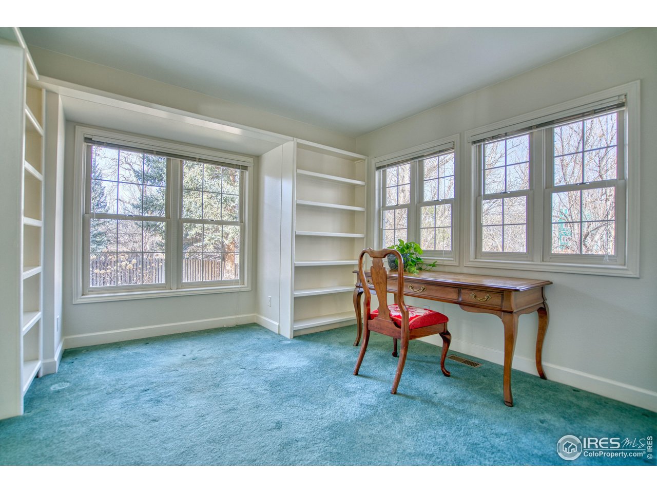 4471 Wellington Road Boulder, CO 80301 - Photo 16 of 42 a room with furniture cabinets and window
