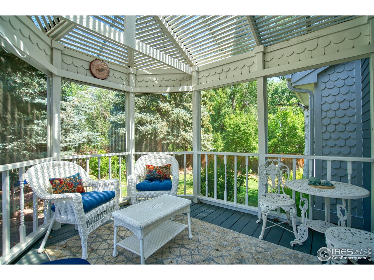 4471 Wellington Road Boulder, CO 80301 - Photo 18 of 42 a view of a chairs and table in the patio