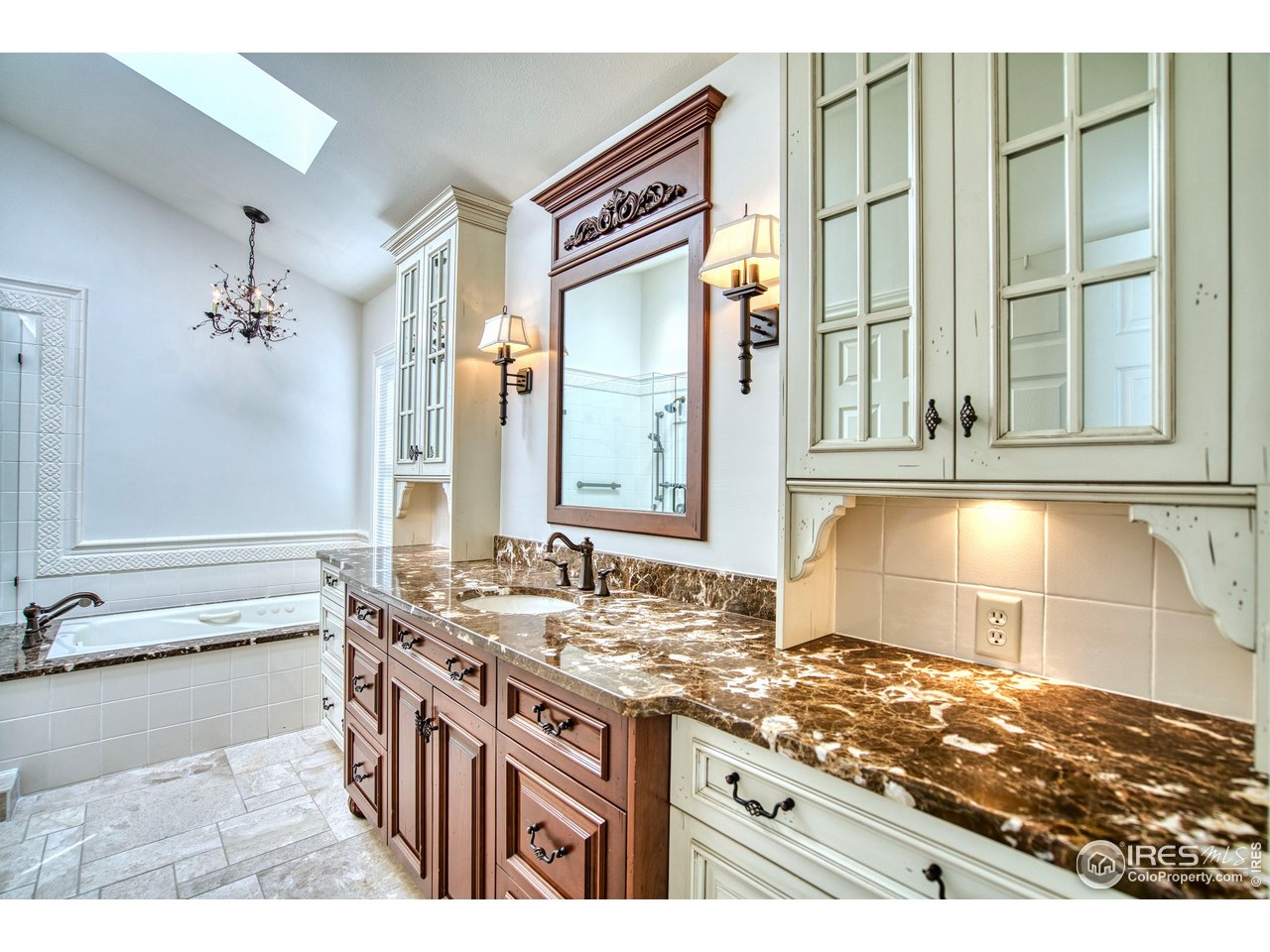 4471 Wellington Road Boulder, CO 80301 - Photo 20 of 42 a bathroom with a sink and a mirror