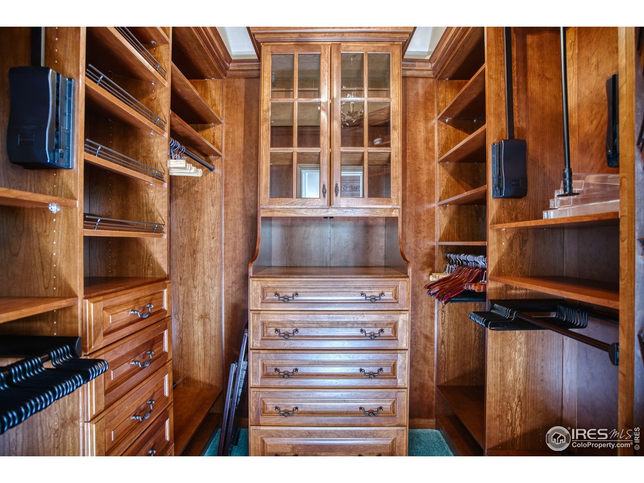 4471 Wellington Road Boulder, CO 80301 - Photo 22 of 42 a view of walk in closet with clothes and shoes