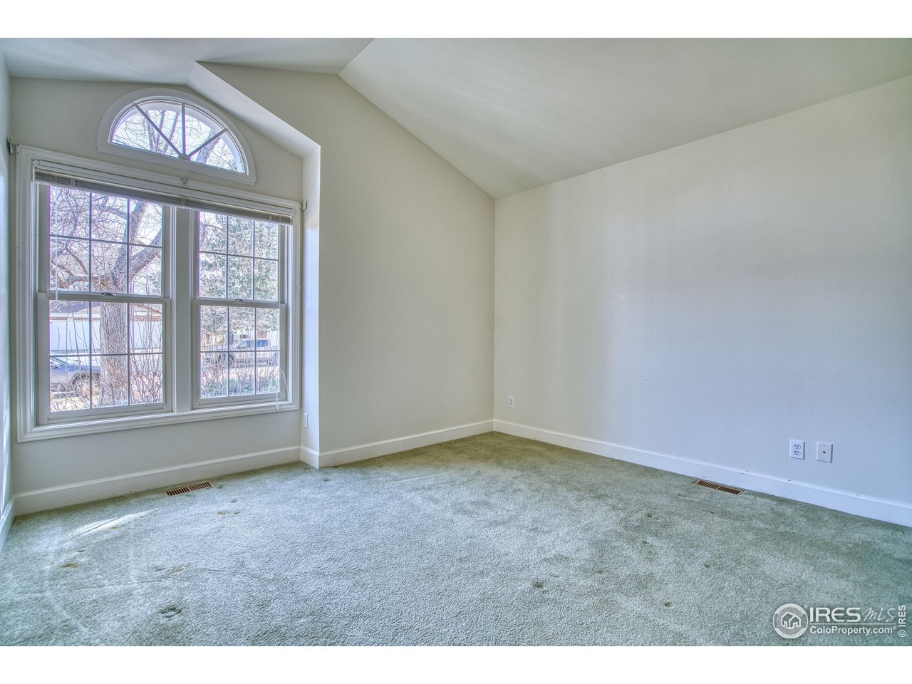 4471 Wellington Road Boulder, CO 80301 - Photo 23 of 42 a view of an empty room with a window