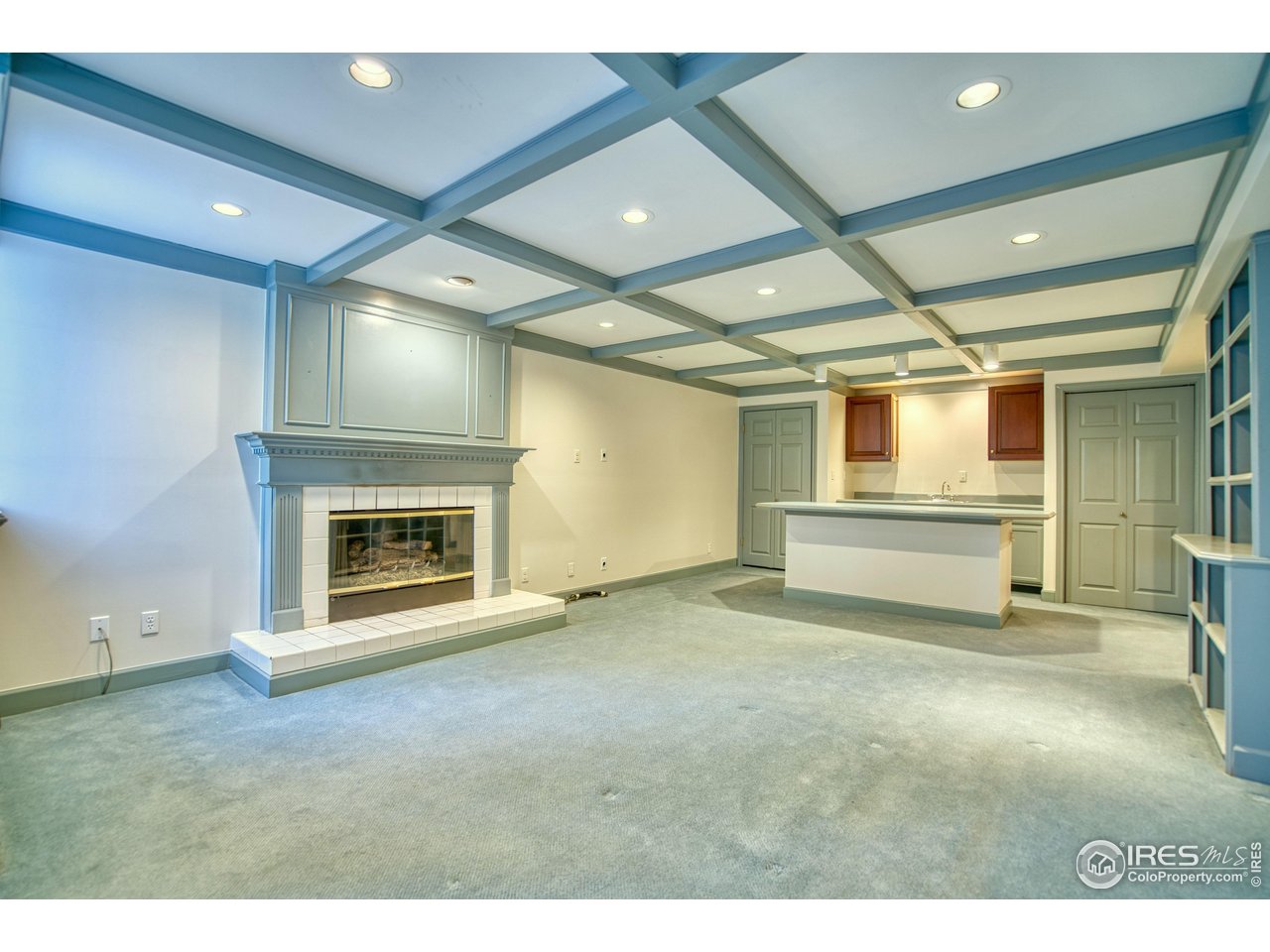 4471 Wellington Road Boulder, CO 80301 - Photo 26 of 42 a view of an empty room with a fireplace and a window