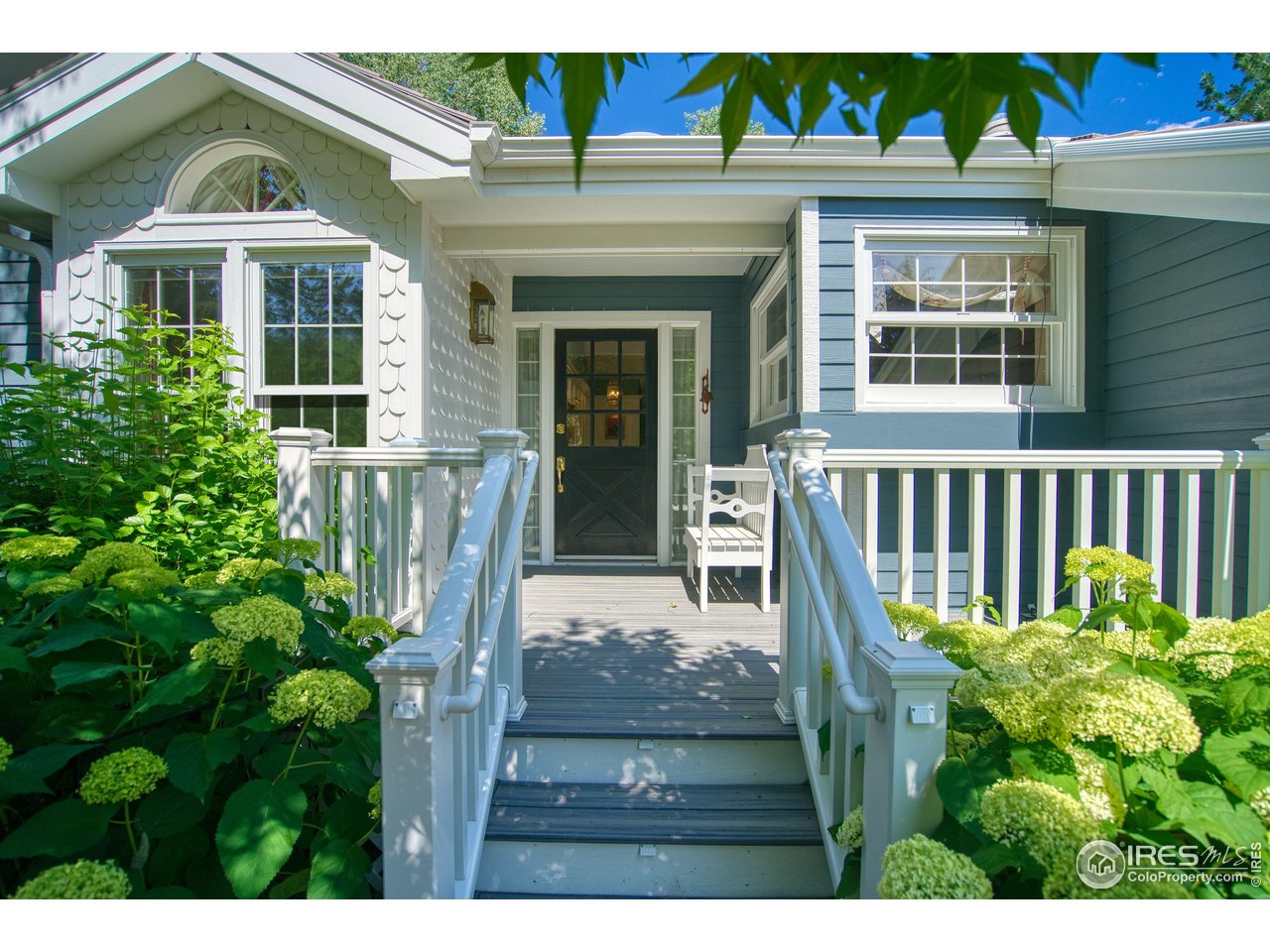 4471 Wellington Road Boulder, CO 80301 - Photo 3 of 42 a view of a house with a small yard and plants