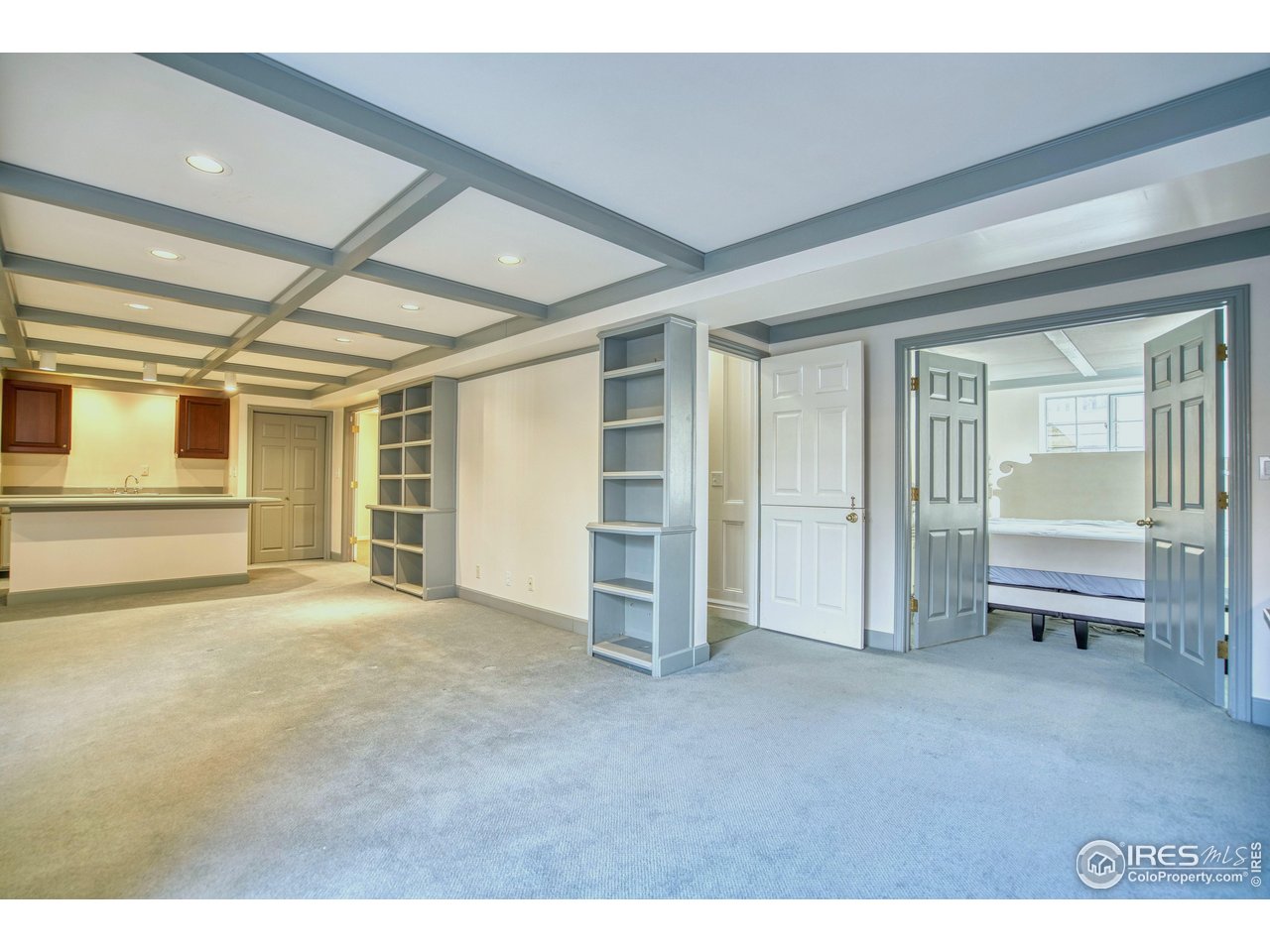 4471 Wellington Road Boulder, CO 80301 - Photo 31 of 42 a view of an empty room with a fireplace and a window