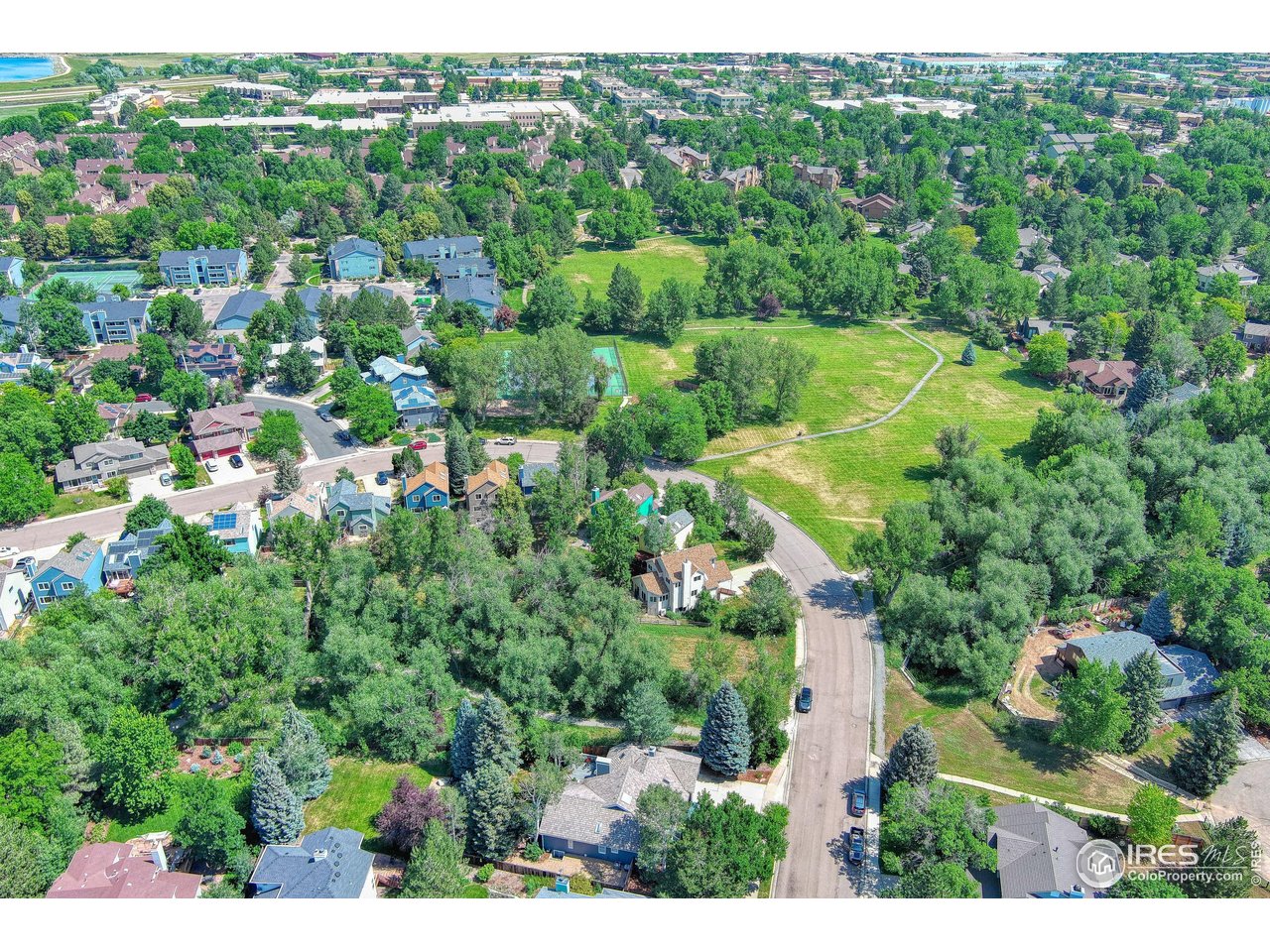 4471 Wellington Road Boulder, CO 80301 - Photo 40 of 42 an aerial view of residential houses with outdoor space and trees