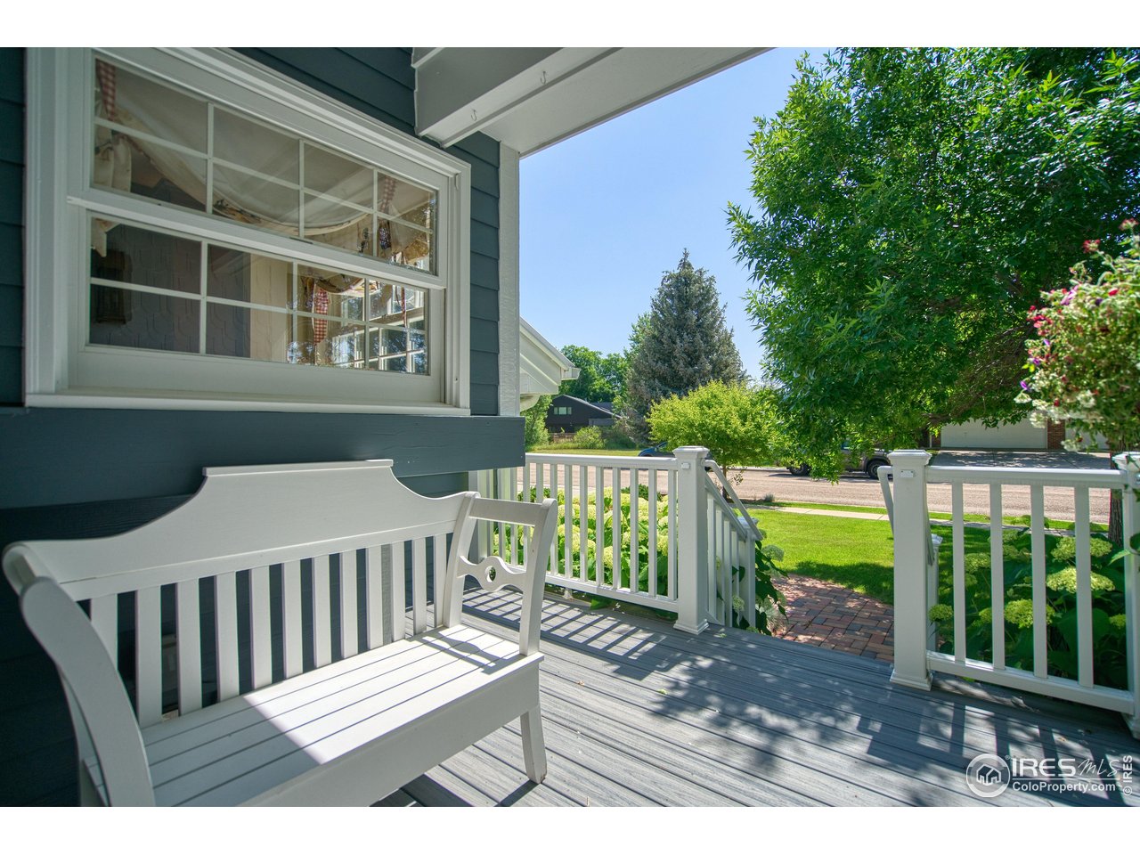 4471 Wellington Road Boulder, CO 80301 - Photo 4 of 42 a view of a wooden deck with a yard