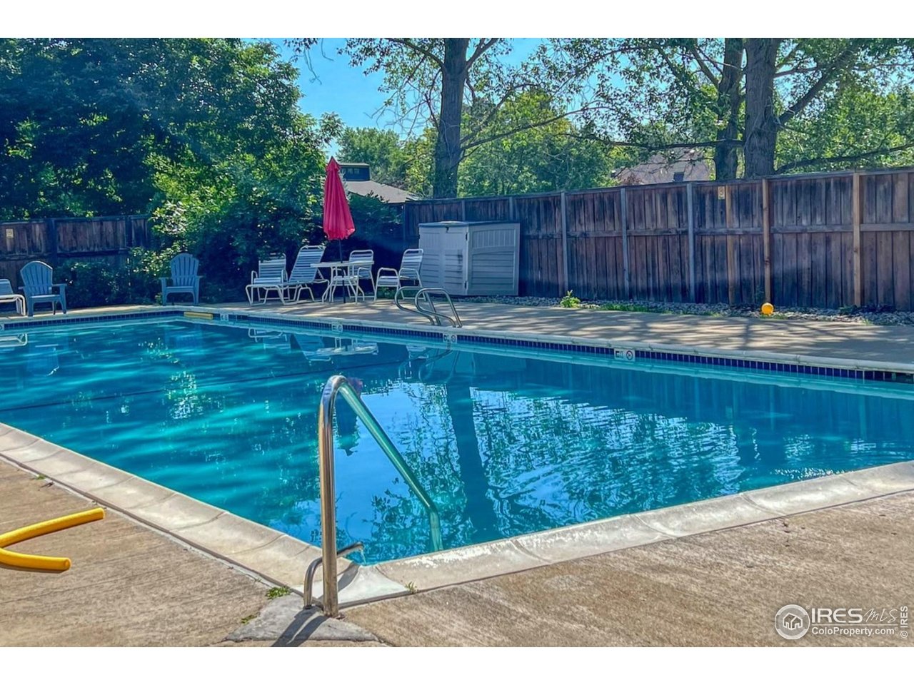 4471 Wellington Road Boulder, CO 80301 - Photo 42 of 42 a view of a backyard with swimming pool