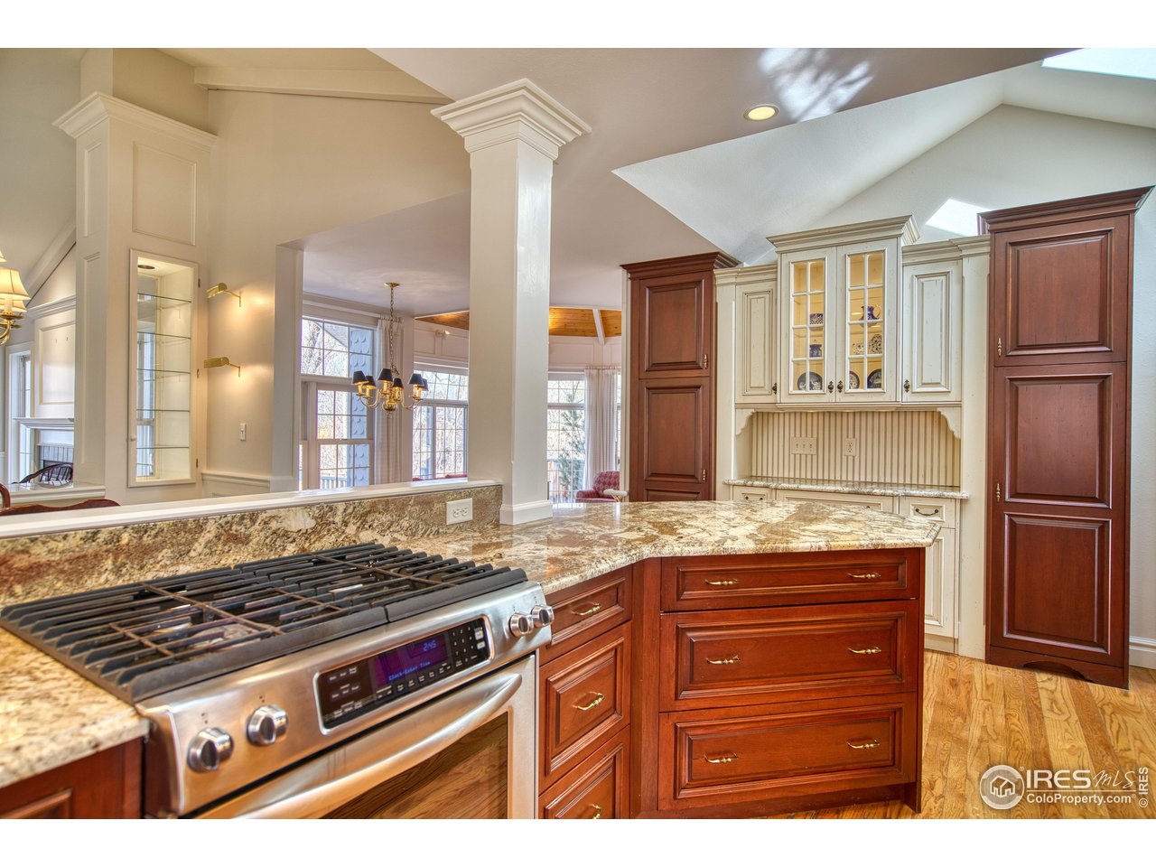 4471 Wellington Road Boulder, CO 80301 - Photo 8 of 42 a kitchen with stainless steel appliances granite countertop a stove and a refrigerator