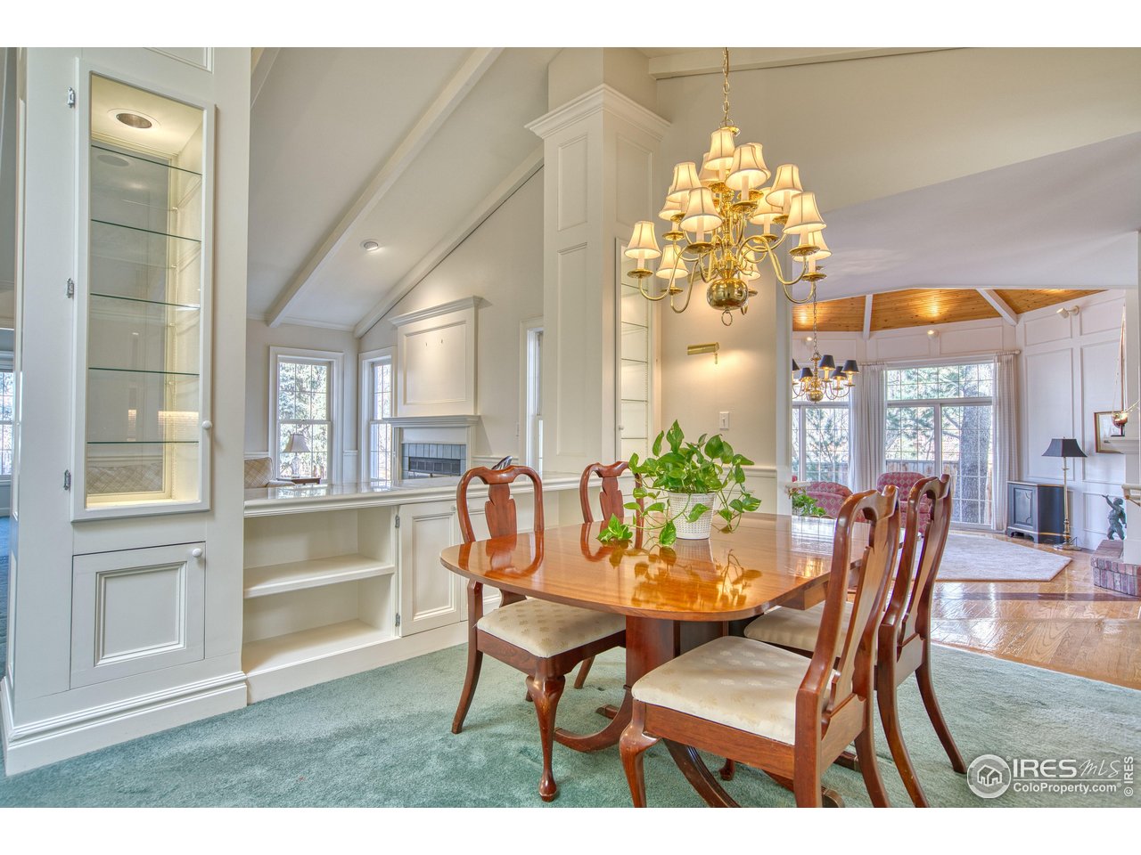 4471 Wellington Road Boulder, CO 80301 - Photo 10 of 42 a dining room with furniture and chandelier