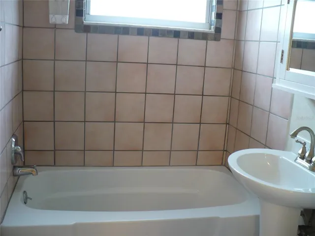 a bathroom with a bathtub