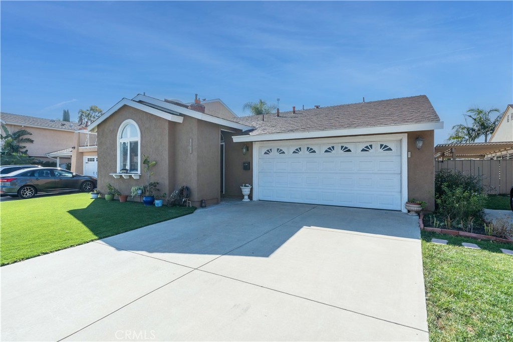 4162 Fireside Circle Irvine, CA 92604 - Photo 1 of 1 a front view of a house with a yard