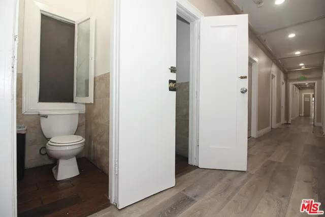 a bathroom with a toilet and a sink