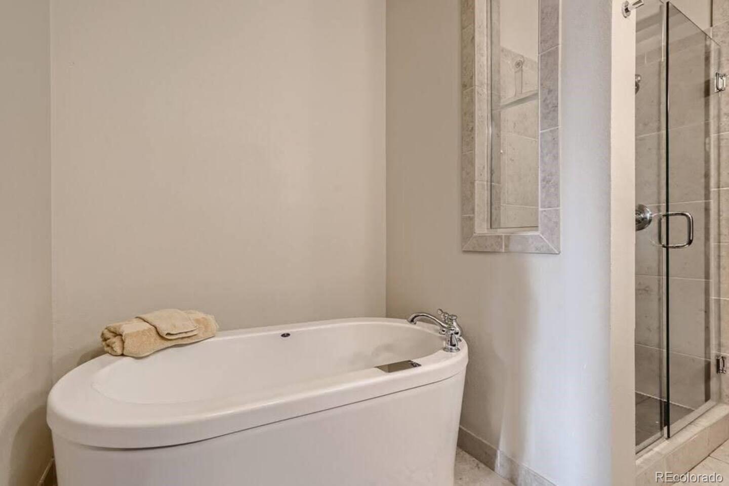 2101 Larimer Street, Unit 303 Denver, CO 80205 - Photo 15 of 21 a bathroom with a sink and toilet