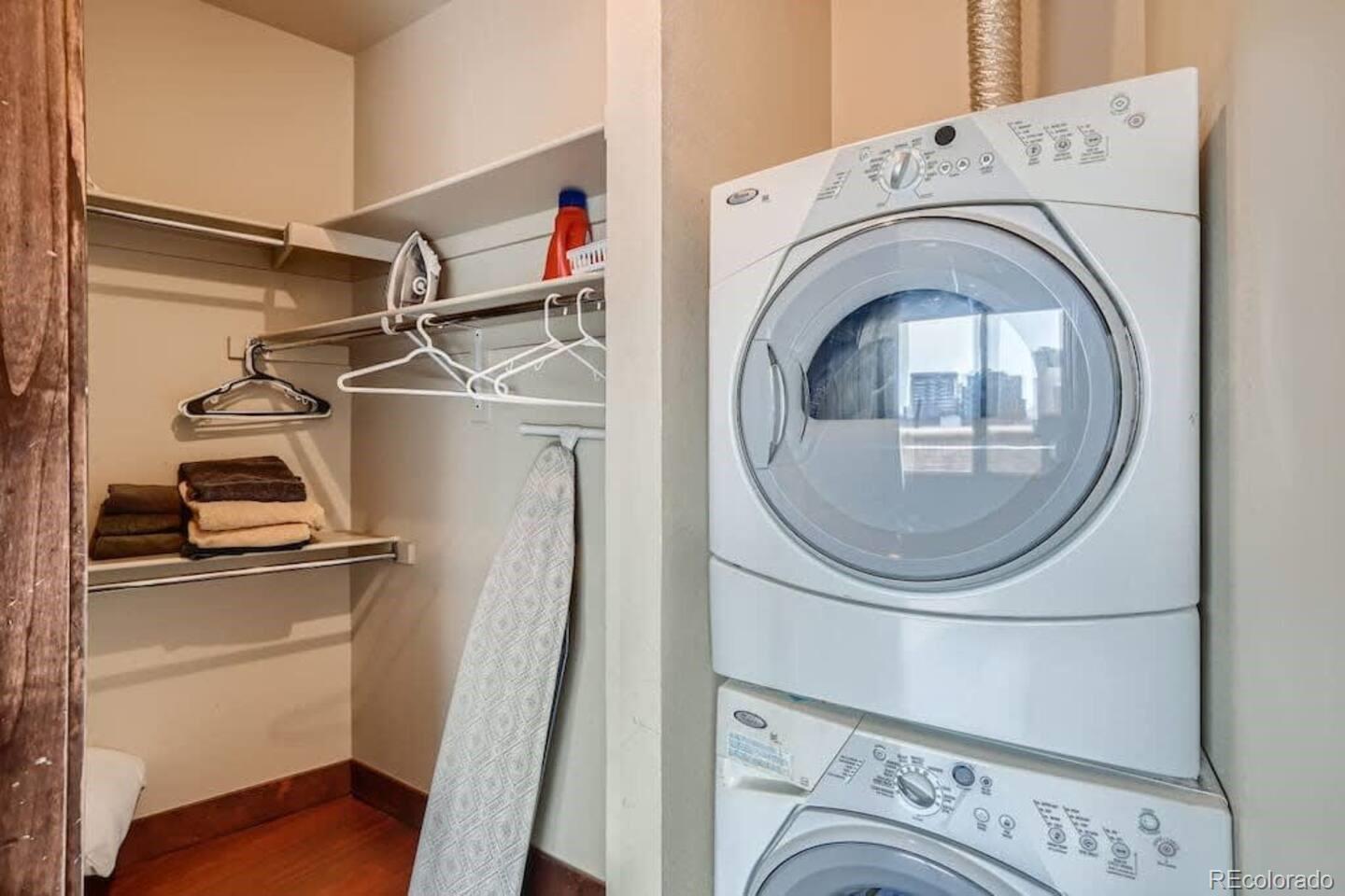 2101 Larimer Street, Unit 303 Denver, CO 80205 - Photo 16 of 21 a utility room with dryer and washer