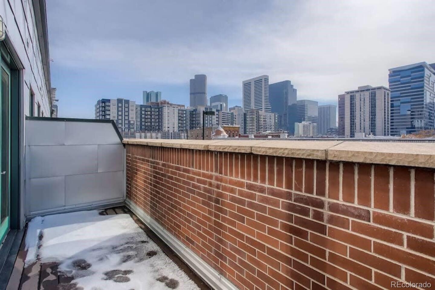 2101 Larimer Street, Unit 303 Denver, CO 80205 - Photo 19 of 21 a view of city from balcony