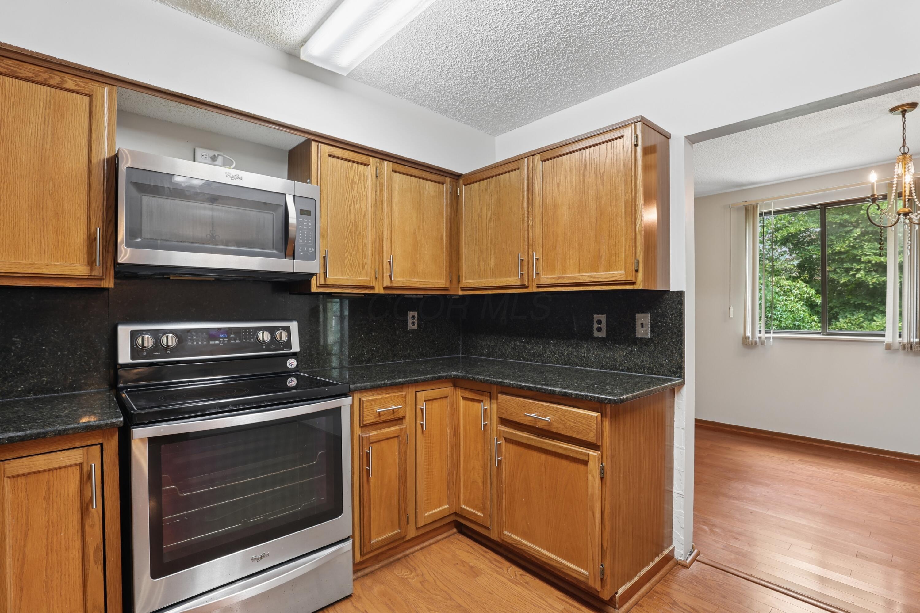 4145 Karl Road, Unit 228 Columbus, OH 43224 - Photo 9 of 29 Stainless Appliances, Granite Counters