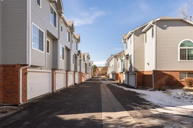 a street view with tall buildings