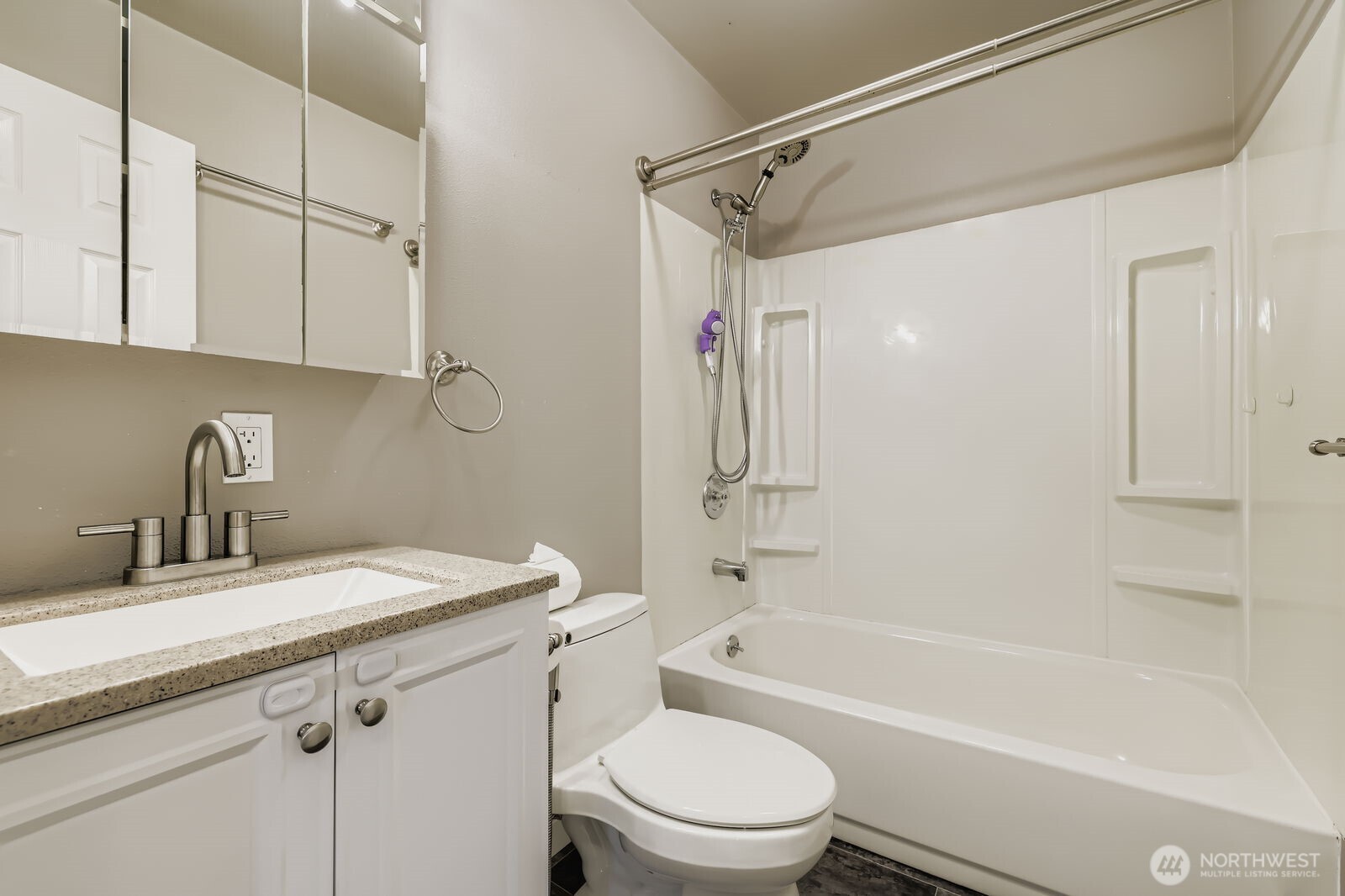 7806 Beverly Boulevard Everett, WA 98203 - Photo 15 of 22 a bathroom with a sink a toilet and shower