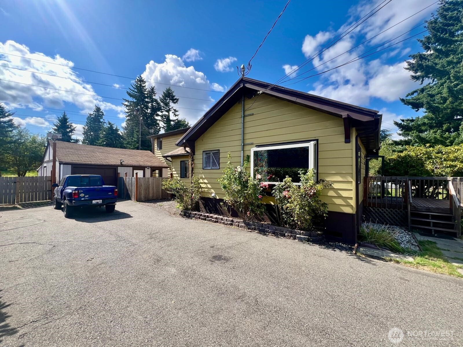 7806 Beverly Boulevard Everett, WA 98203 - Photo 2 of 22 a view of house with truck parked on the road