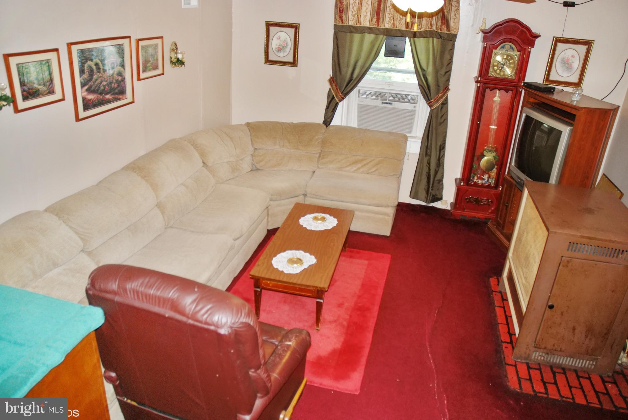 24211 Ridge Road Damascus, MD 20872 - Photo 5 of 15 Family Room: Hardwood flooring under the carpet