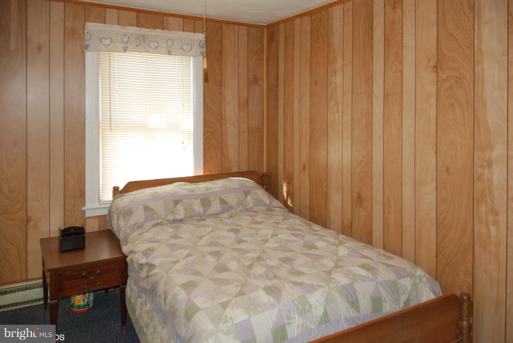 24211 Ridge Road Damascus, MD 20872 - Photo 9 of 15 Bedroom: Hardwood Flooring under the carpet
