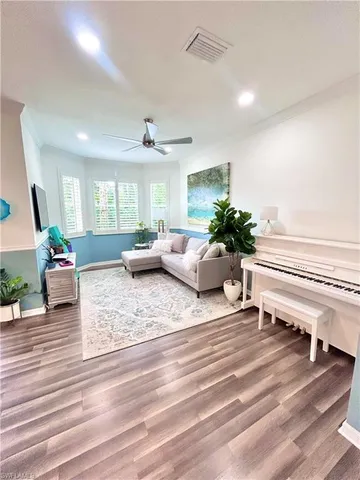 a bathroom with a sink mirror and toilet