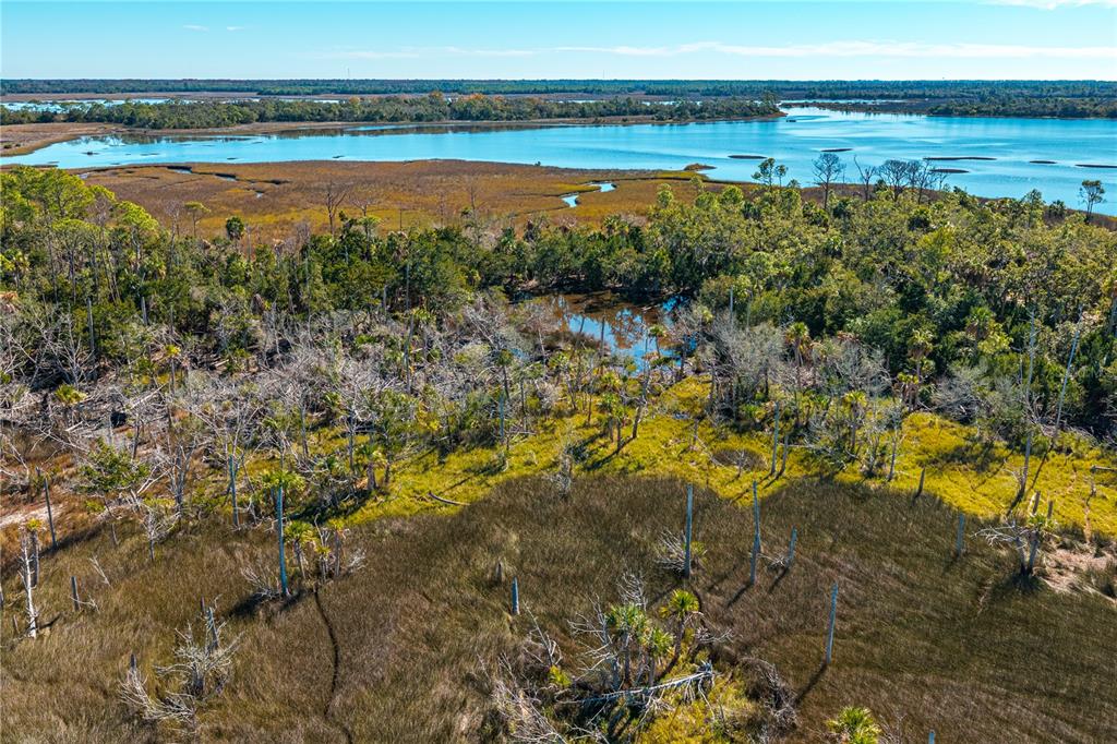 Clark Island Cedar Key, FL 32625 - Photo 5 of 46 a view of an ocean and beach