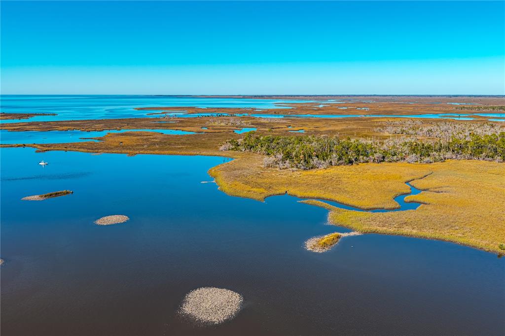 Clark Island Cedar Key, FL 32625 - Photo 10 of 46 a view of an ocean and beach