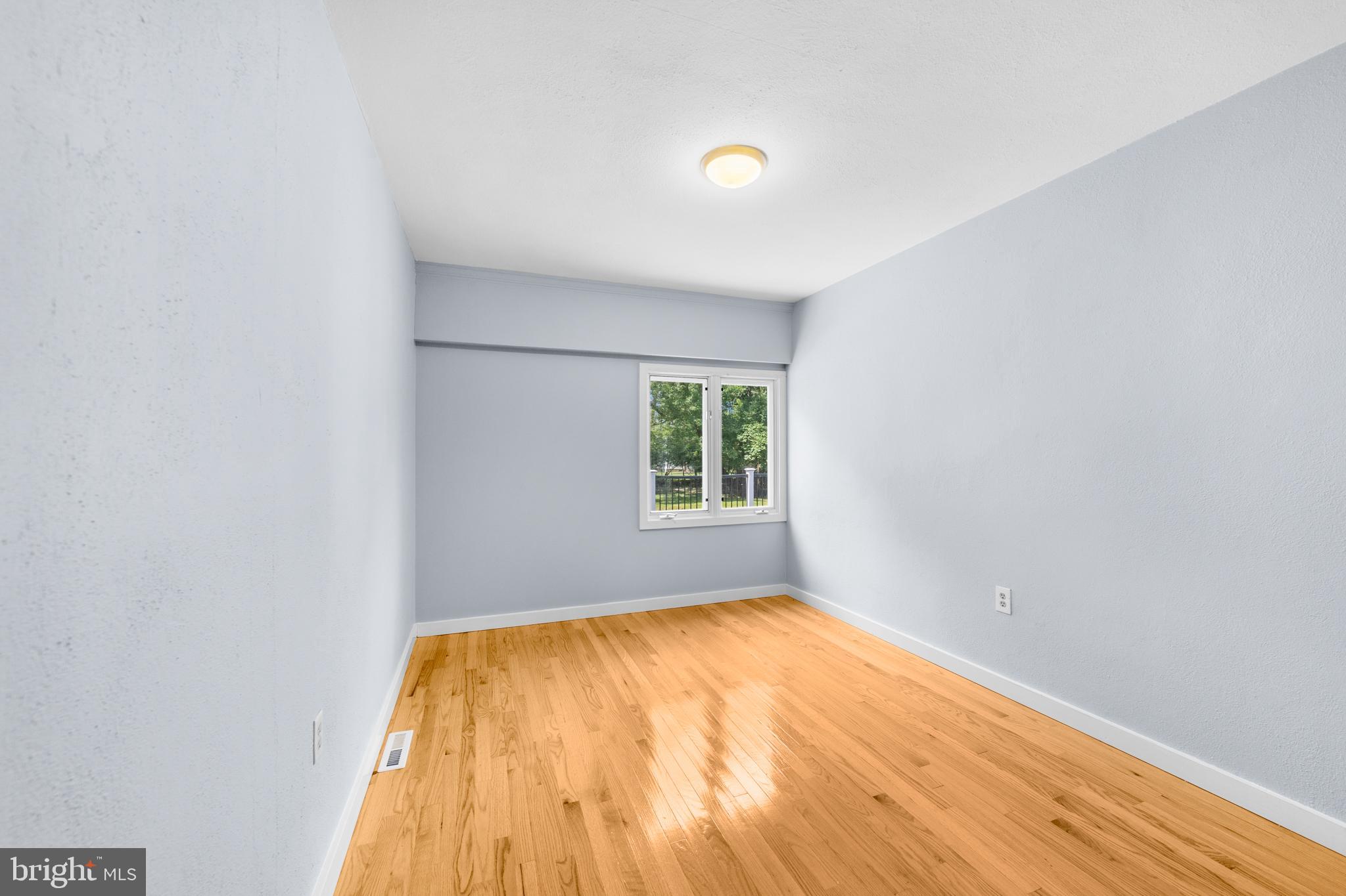 638 Princeton Kingston Road Princeton, NJ 08540 - Photo 19 of 35 a view of empty room with wooden floor and fan