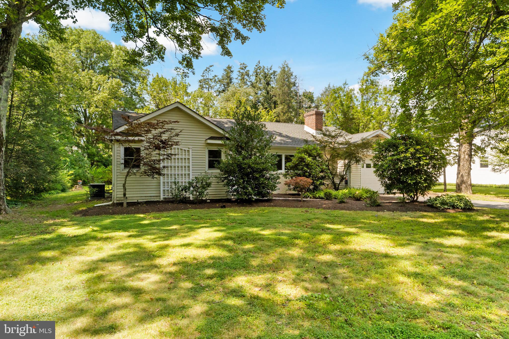638 Princeton Kingston Road Princeton, NJ 08540 - Photo 2 of 35 a view of a fountain in front of a house with a big yard