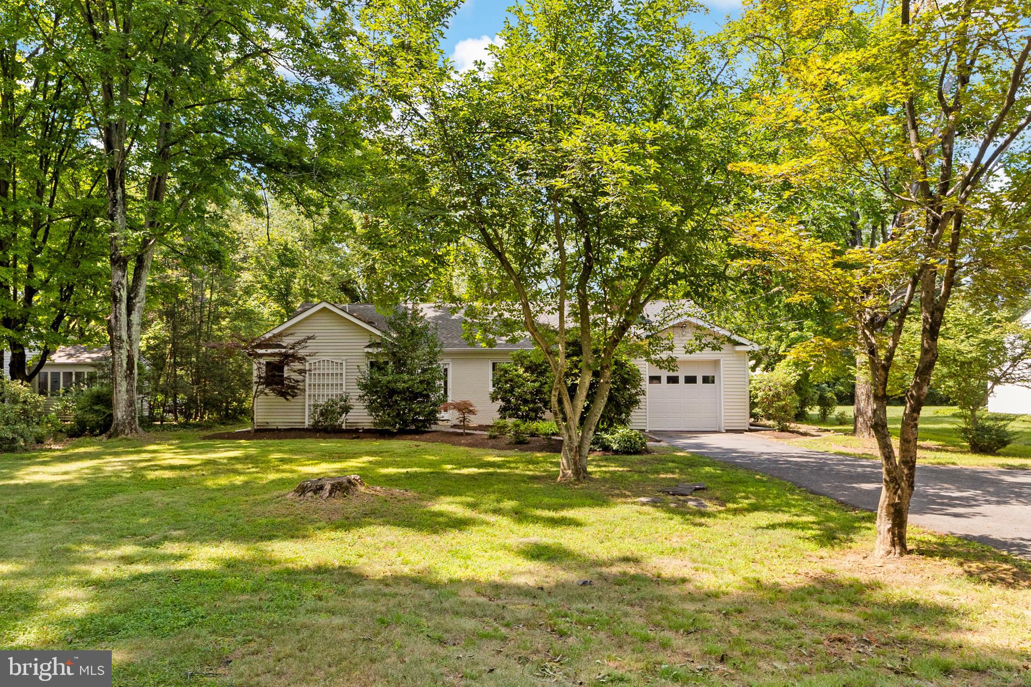 638 Princeton Kingston Road Princeton, NJ 08540 - Photo 3 of 35 a swimming pool with trees in front of it