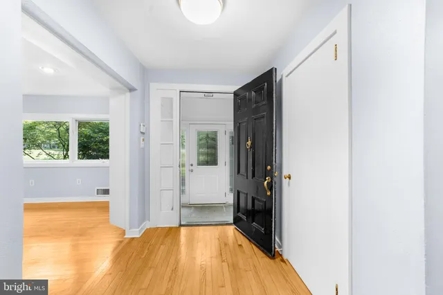 a view of a bedroom with a large window
