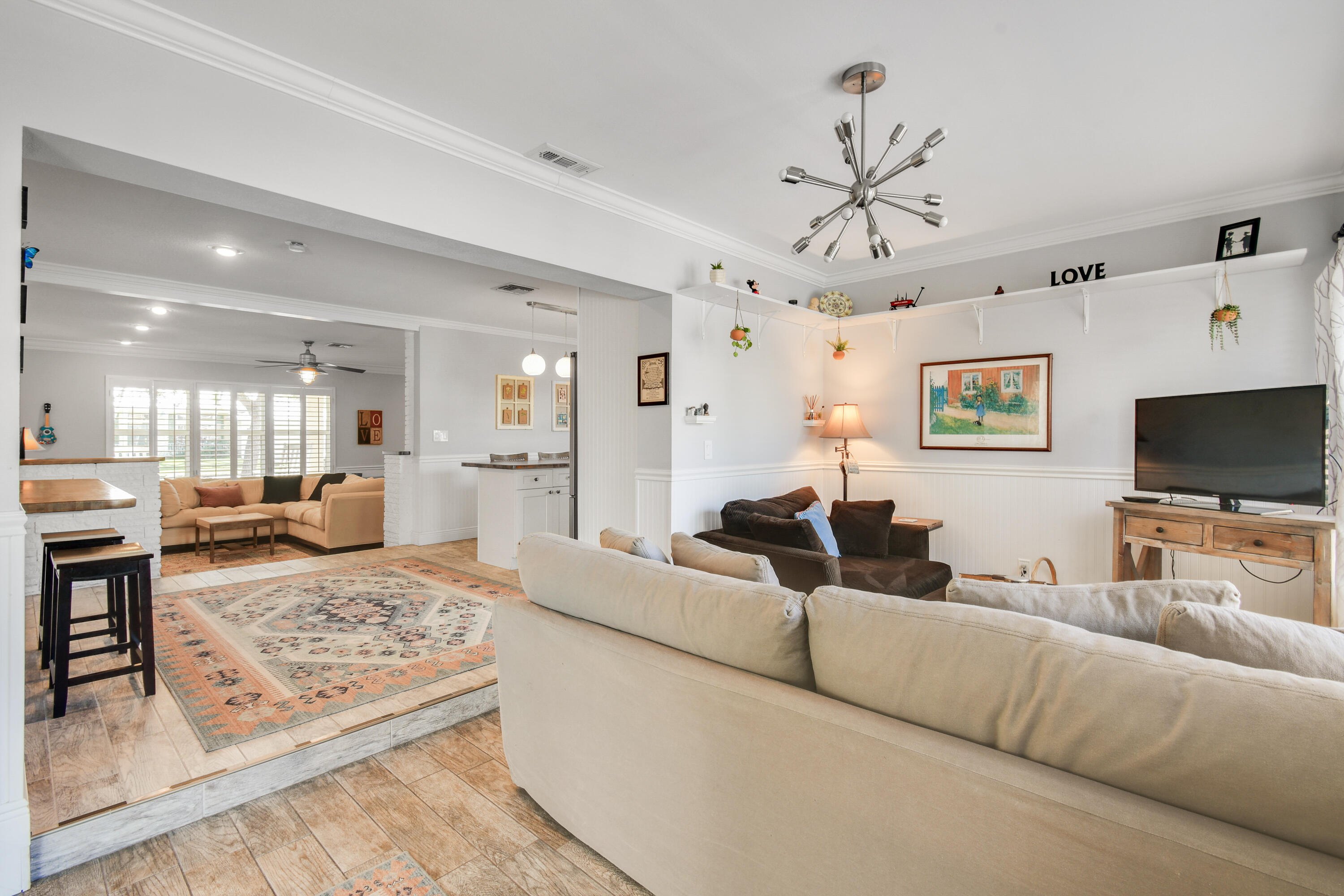 8963 Southeast Ceres Street Hobe Sound, FL 33455 - Photo 20 of 52 Den to LR