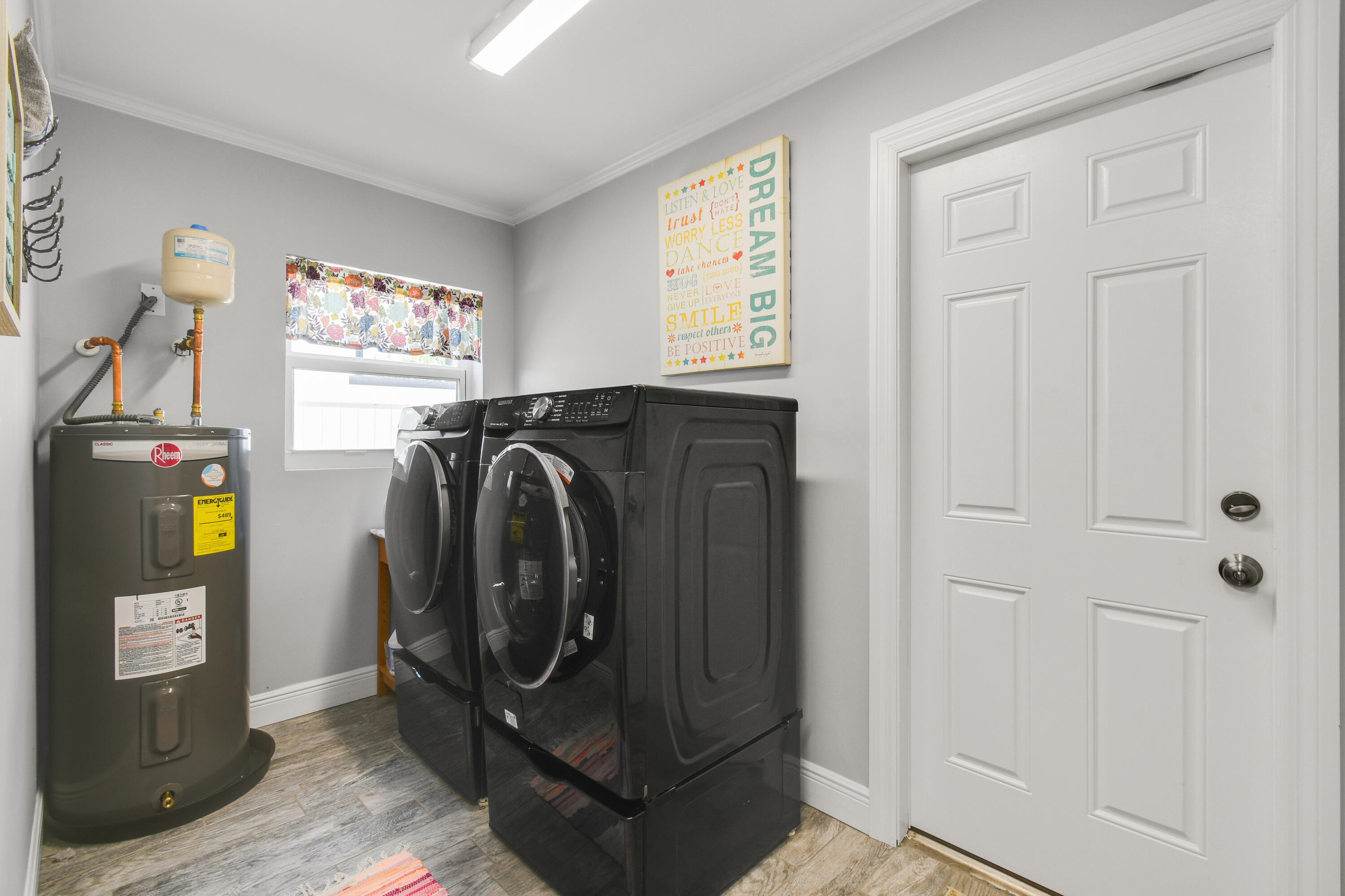 8963 Southeast Ceres Street Hobe Sound, FL 33455 - Photo 39 of 52 Laundry room