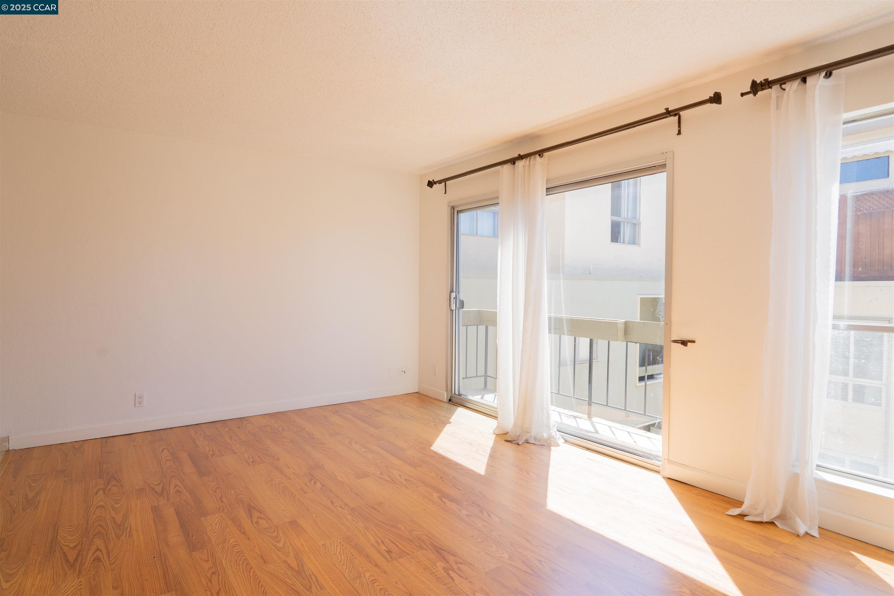 466 Crescent Street, Unit 306 Oakland, CA 94610 - Photo 14 of 26 a view of an empty room