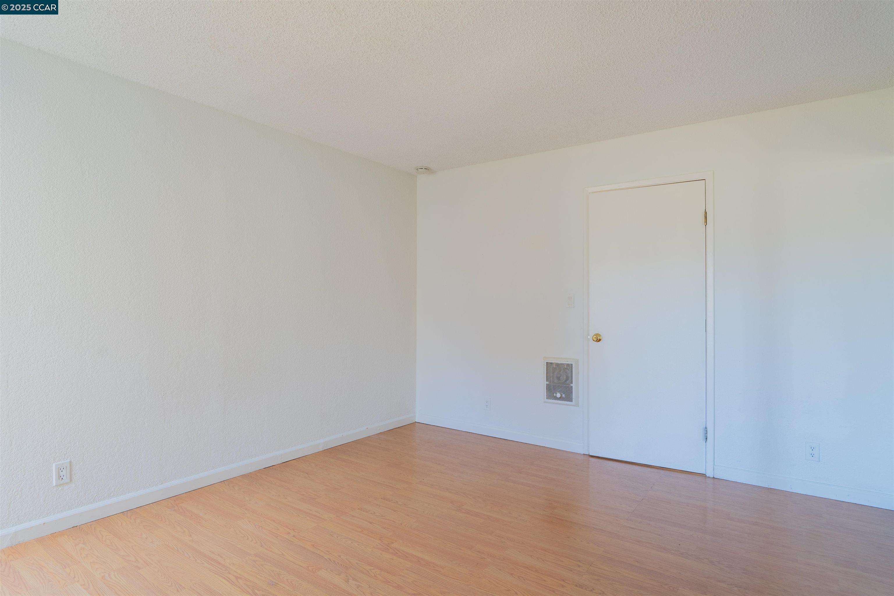 466 Crescent Street, Unit 306 Oakland, CA 94610 - Photo 17 of 26 a view of an empty room