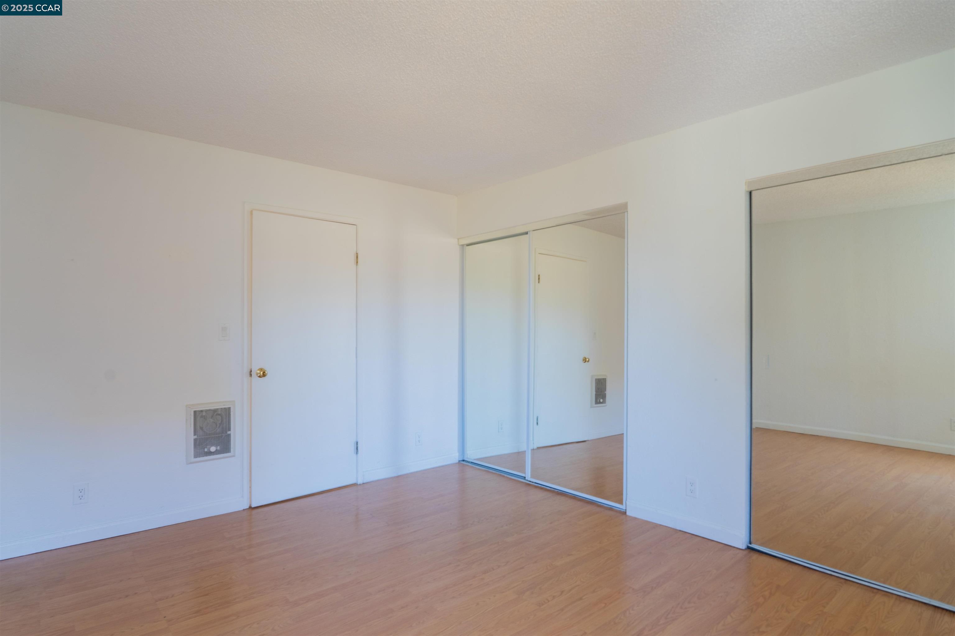 466 Crescent Street, Unit 306 Oakland, CA 94610 - Photo 18 of 26 a view of an empty room