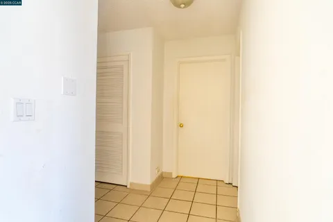 a entryway with wooden floor